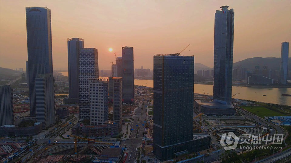 实拍视频素材-航拍城市高楼建筑日落晚霞夕阳实拍视频素材  灵感中国网 www.lingganchina.com